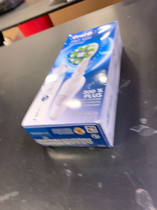 Photo 1 of Oral-B Pro 1000 Rechargeable Electric Toothbrush, White