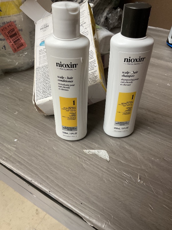 Photo 1 of Nioxin Scalp + Hair Thickening System 1 | For Natural or Untreated Hair with Light Thinning | With Niacinamide and Biotin | Trial Size | 1 Month Supply