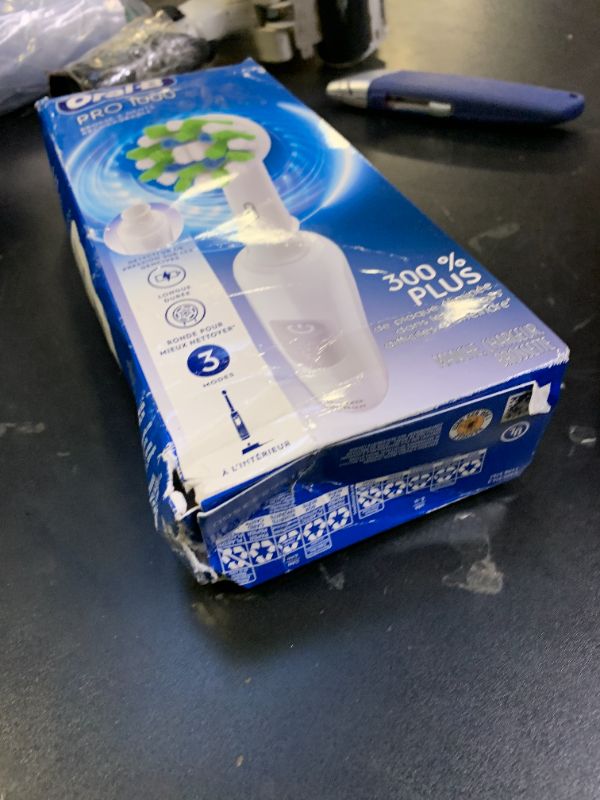 Photo 1 of Oral-B Pro 1000 Rechargeable Electric Toothbrush, White