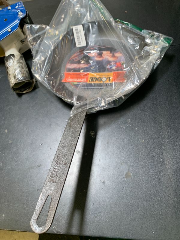Photo 1 of Lodge Pre-Seasoned Carbon Steel Skillet - Use in the Oven, on the Stove, on the Grill, or Over a Campfire - 10 Inch