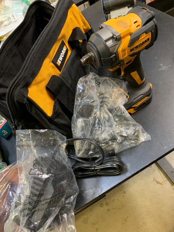 Photo 1 of EWORK Cordless Impact Wrench 21V Brushless Compact 1/2 Impact Gun Max 520 Ft-lbs Power Impact Wrenches with 4.0Ah Li-ion Battery, Fast Charger, 5 Sockets, Tool Bag (RB-809)