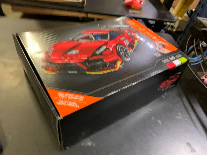 Photo 1 of OWNONE 1 Remote Control Super Car Building Kits, 1835PCS Technique Plated Race Car Building Set for Adults Men Teens - with 5 Fast Motors, Electric Height Adjustment & Drift Spin Wheels