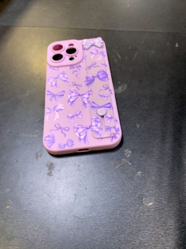 Photo 1 of TEAUGHT for iPhone 16 Pro Max Bow Case with Wrist Hand Strap Stand, Cute Bowknot Design with Finger Grip Holder, Soft TPU Shockproof Protective Cover for Women Girls - Purple