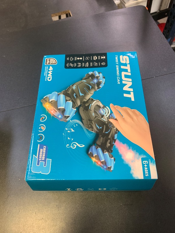 Photo 1 of Pristar RC Stunt Cars, Gesture Sensing Remote Car Toys for 6-12 Boys Girls, 2.4Ghz Hand Remote Control Car with Spray Lights Music 360° Rotation 4WD Off-Road, Birthday Xmas Gifts for Kids Age 6-12
