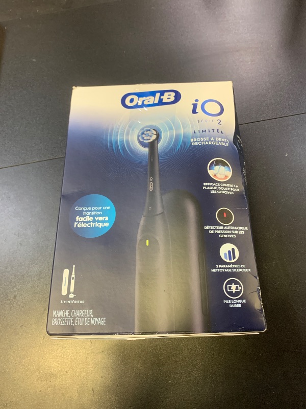 Photo 1 of Oral-B iO Simple Clean Rechargeable Electric Powered Toothbrush, Night Black with 1 Gentle Care Brush Head and 1 Black Travel Case - Automatic Pressure Sensor to Protect Gums - 3 Modes - 2 Min Timer