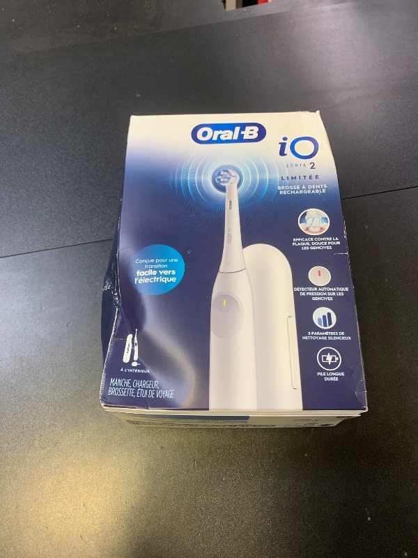 Photo 1 of Oral-B iO Simple Clean Rechargeable Electric Powered Toothbrush, Pure White with 1 Gentle Care Brush Head and 1 White Travel Case - Automatic Pressure Sensor to Protect Gums - 3 Modes -2 Min Timer
