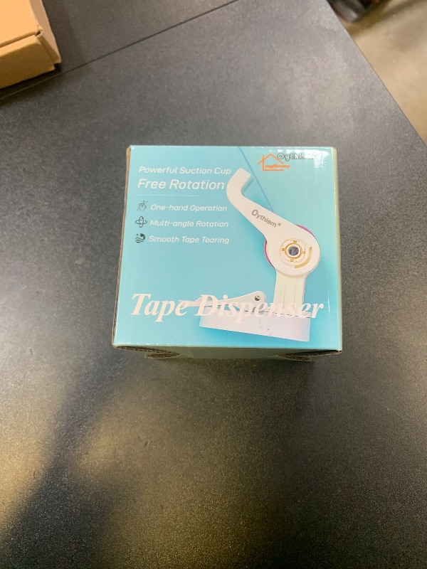 Photo 1 of Oythiem Mini White Tape Dispenser?Non-Slip Suction Cup & 360° Rotating Arm for One-Handed Operation, Small Clear Suction Cup Tape Dispenser Desk for Packing, Office, Home, Fits 1" Core
