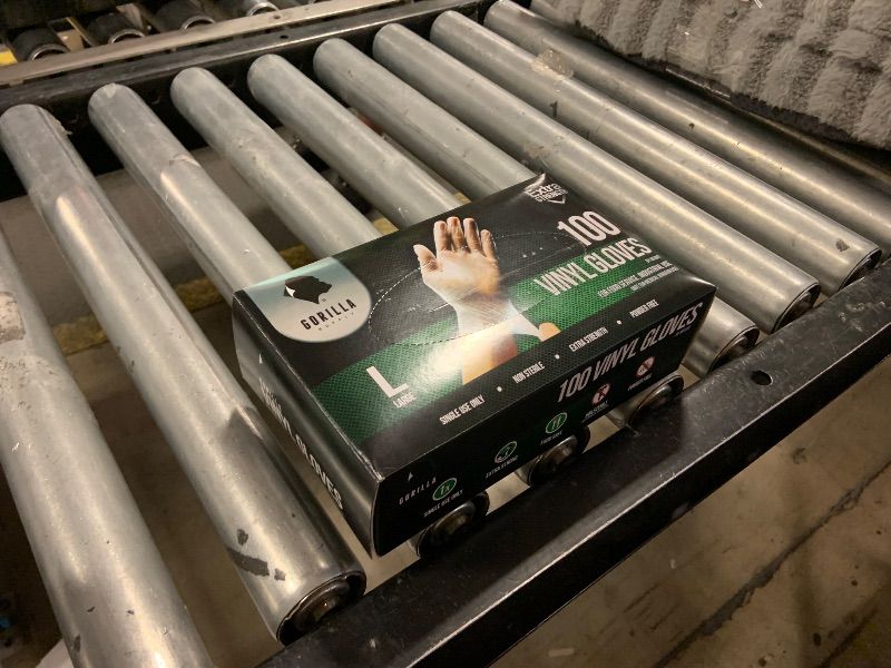Photo 1 of 100 vinyl gloves
