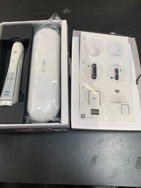 Photo 1 of Oral-B iO Series 10 Rechargeable Electric Toothbrush with Visible Pressure Sensor to Protect Gums, 2 Min Timer, 7 Cleaning Settings, 4 Replacement Toothbrush Heads, and Charging Travel Case, White
