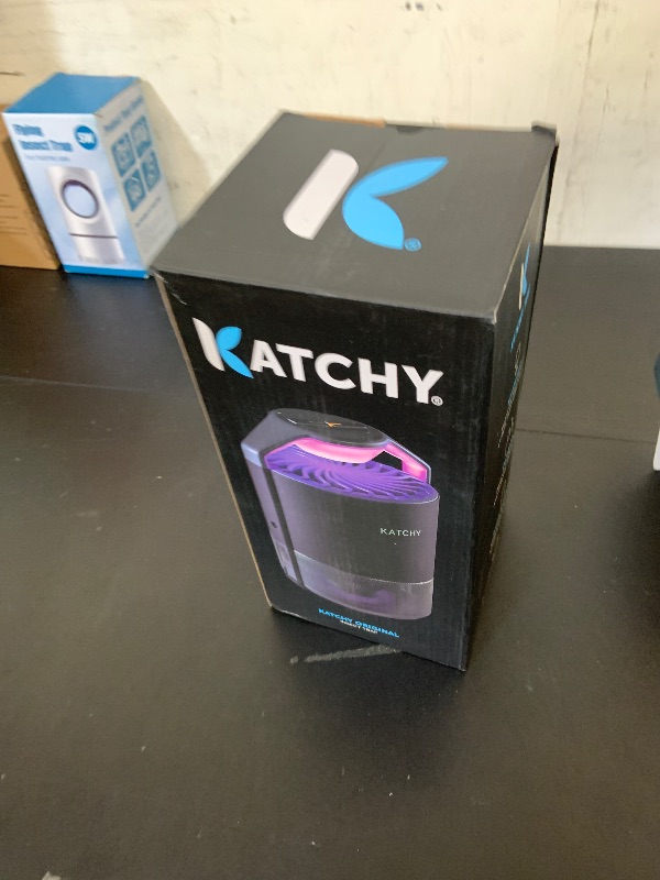 Photo 1 of Katchy Indoor Insect Trap - Catcher & Killer for Mosquitos, Gnats, Moths, Fruit Flies - Non-Zapper Traps for Inside Your Home - Catch Insects Indoors with Suction, Bug Light & Sticky Glue (Black)