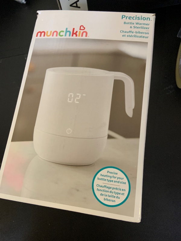 Photo 1 of Munchkin® Precision Baby Bottle Warmer for Breastmilk, Formula, Food Jars, and Sterilizing Small Parts - Compatible with All Bottle Brands, Glass, Silicone & Plastic, Digital Display, White (Plug-in)
