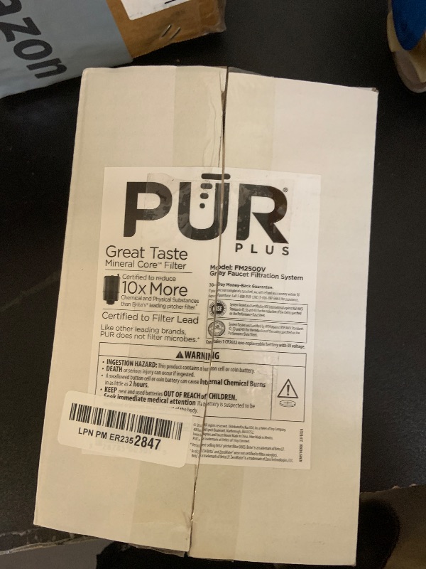 Photo 1 of PUR PLUS Vertical Faucet Mount Water Filtration System, Lead-Reducing Filter, Great-Tasting Water, Easy Install, Lasts 100 Gallons, Compatible with Sinks with External Aerators, Grey
