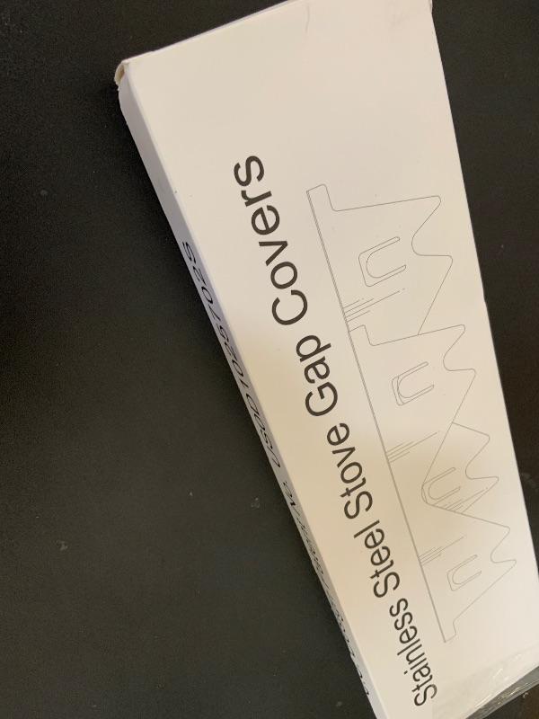 Photo 1 of Stainless Steel Stove Gap Covers,Stove Gap Filler, Range Trim Kit, Stove Gap Guards, Heat Resistant and Easy to Clean, Easy retractable Length 13.8" to 27.5", Width 0.79",Silver(2PCS)