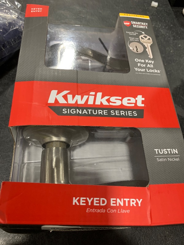 Photo 1 of Kwikset Tustin Entry Door Handle with Lock and Key, Secure Keyed Reversible Lever Exterior, For Front Entrance and Bedrooms, Satin Nickel, Pick Resistant Smartkey Rekey Security and Microban