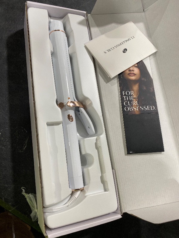Photo 1 of T3 SinglePass Curl X Extra-Long Barrel Curling Iron with 9 Heat Settings and Ceramic Barrel for Fast Styling and Lasting Results on All Hair Types