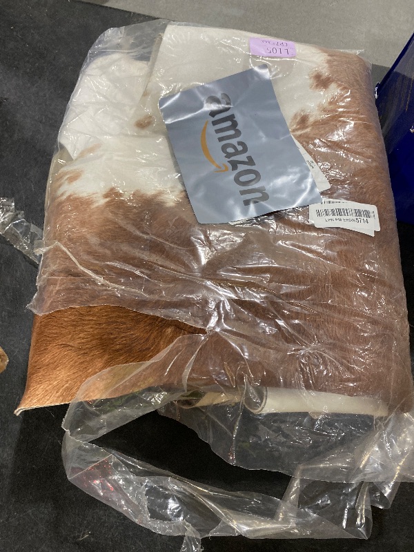 Photo 1 of BENRON Premium Cowhide Rug, Faux Cow Hide Rugs for Living Room Bedroom Western Home Decor, Non Slip Cute Rug with Irregular Animal Skins and Hides, Khaki Brown, 5.2 x 6.2ft
