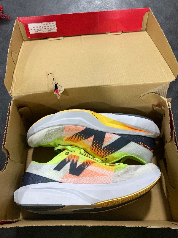 Photo 1 of New Balance Men's FuelCell Rebel V4 Running Shoe, White/Bleached Lime Glo/Hot Mango, 10 Wide