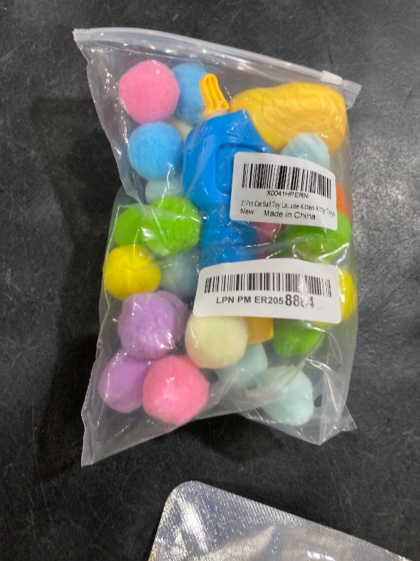 Photo 1 of MeoHui 31Pcs Cat Ball Toy Launcher Gun,Cat Balls Fetch Toy,30Pcs Plush Fuzzy Balls Launcher Cat Toy for Cats with 1 Gun,Funny Interactive Cat Toys for Bored Indoor Adult Cats,Cute Kitten Kitty Toys