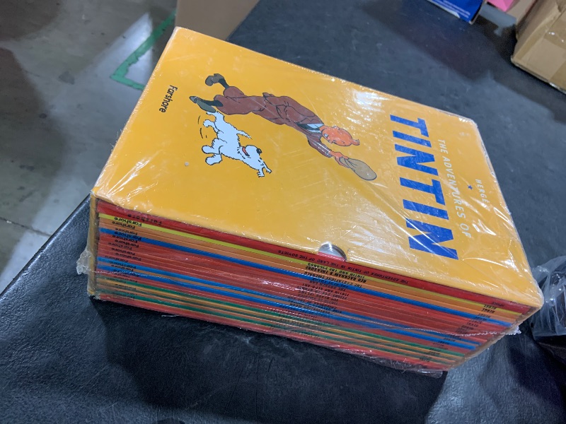Photo 1 of Tintin Paperback Boxed Set 23 titles Paperback – December 18, 2018