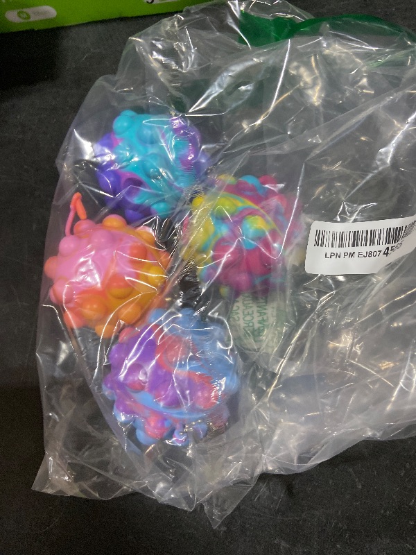 Photo 1 of Pop Fidget Toys Bulk Its Ball Toy 4 PCS 3D Stress Balls It Pop Fidgets Pack Christmas Stocking Stuffers for Kids Party Favors Autism Sensory Toys Squeeze Toys for Kids Boys Toddler Adult Stress Relief