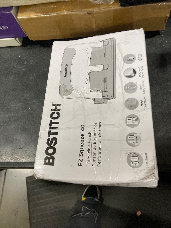 Photo 1 of Bostitch Office EZ Squeeze Heavy Duty 3 Hole Punch, 40-Sheet Capacity, Use Less Force, Perfect for Home Office School Supplies, Sleek Design, Silver