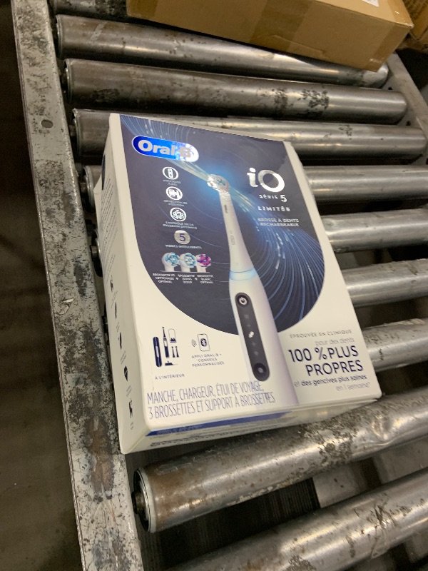 Photo 1 of Oral-B iO Deep Clean + Whiten Rechargeable Electric Toothbrush with Visible Pressure Sensor, 2 Minute Timer, 5 Cleaning Settings, 1 iO5 Limited, 3 Toothbrush Heads, Travel Case & Refill Holder, White