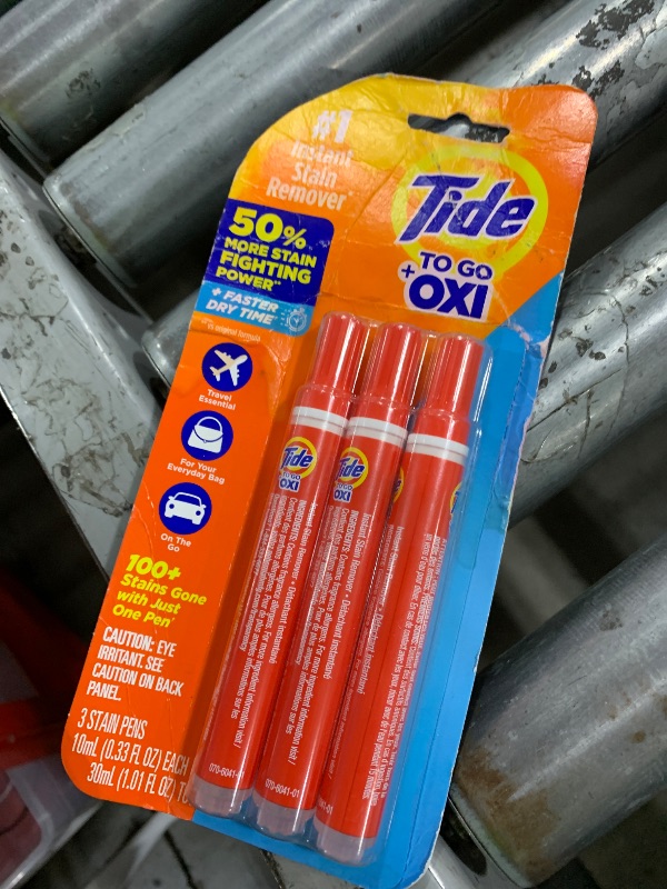 Photo 1 of Tide Stain Remover for Clothes, Tide To Go Pen, Instant Stain Remover Pen & Spot Cleaner, Portable & Travel-Friendly, Works on Food & Drink Stains, Fits in Purses & Bags, 3 Count (Pack of 1)