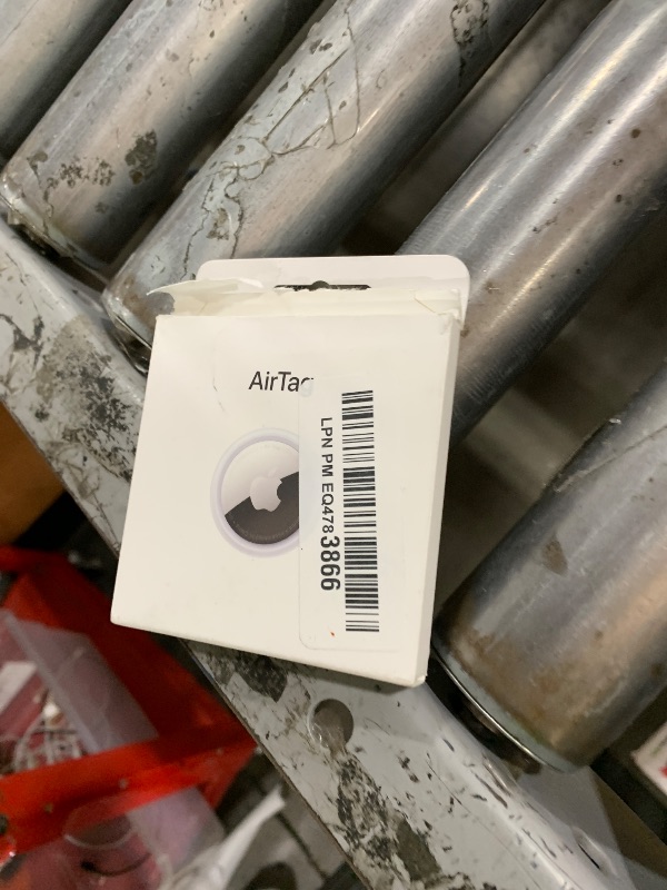 Photo 1 of Apple AirTag. Keep Track of and find Your Keys, Wallet, Luggage, Backpack, and More. Simple one-tap Set up with iPhone or iPad