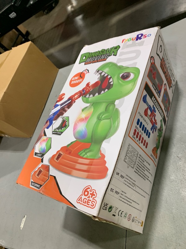 Photo 1 of fygurso Movable Dinosaur Shooting Toys for Kids 5-7 with 2 Air Pump Gun, Target Shooting Games with LED Score Record, Light & Sound, 24 Foam Balls Competition Game Gift for Boys and Girls 3 4 5 6 7+