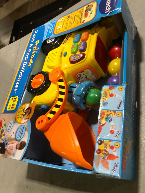 Photo 1 of VTech Pop-a-Balls Push and Pop Bulldozer, Yellow