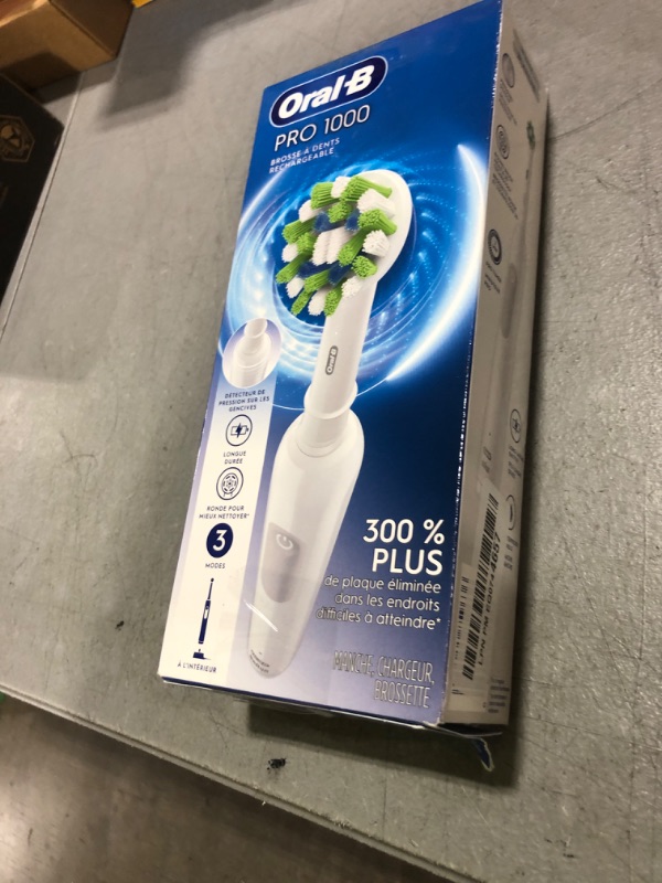 Photo 1 of Oral-B Pro 1000 Rechargeable Electric Toothbrush, White