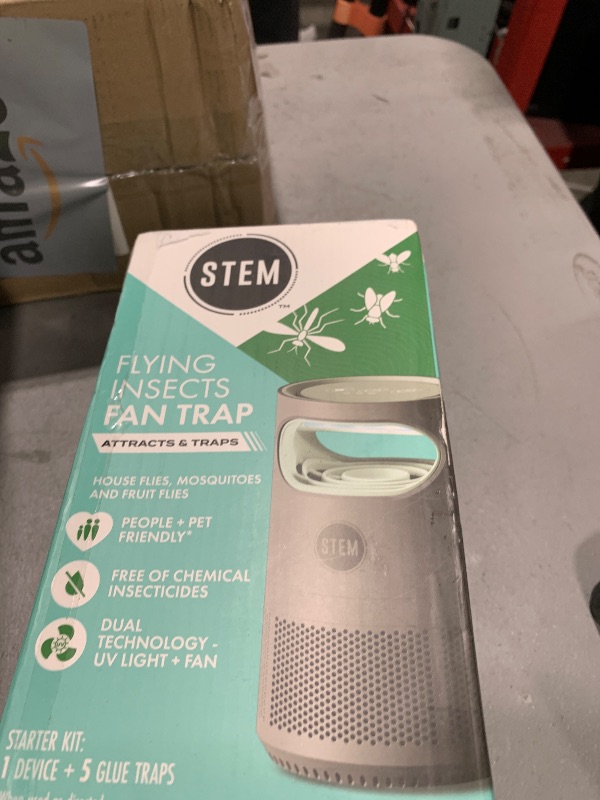 Photo 1 of STEM Flying Insect Fan Trap for Indoor Bug Control, Attracts Mosquitoes, Fruit Flies, and House Flies, Plug-in Fan with UV Light, Starter Kit Includes 1 Device and 5 Glue Traps