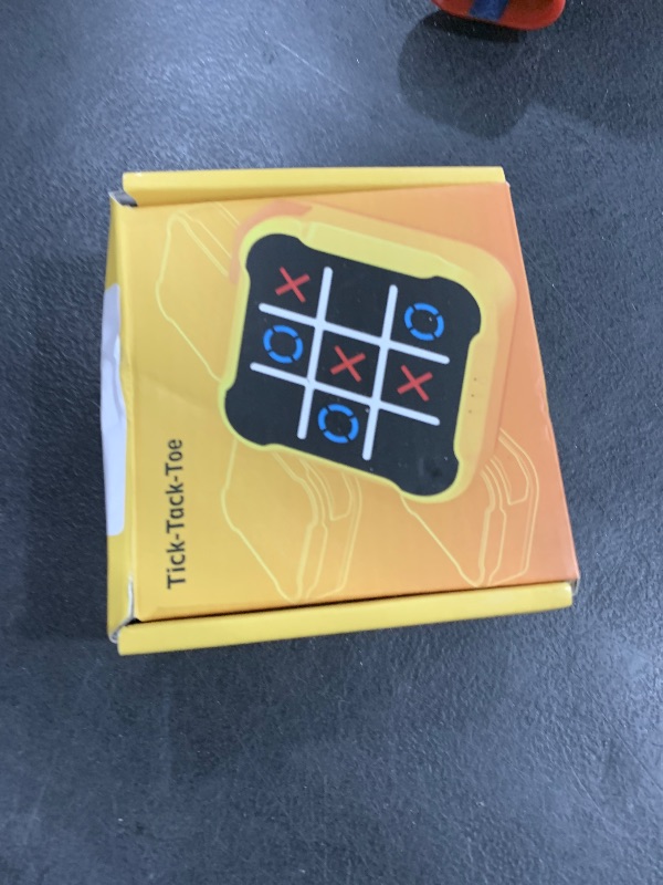 Photo 1 of COUOMOXA Fits Tic Tac Toe Games for Kids: 4-in-1 Portable Sensory Puzzle Game - 6 7 8 9 10 11 12 Years Old Kids Electronic Toy for Travel Home School (4-in-1 Tic Tac Toe Games)