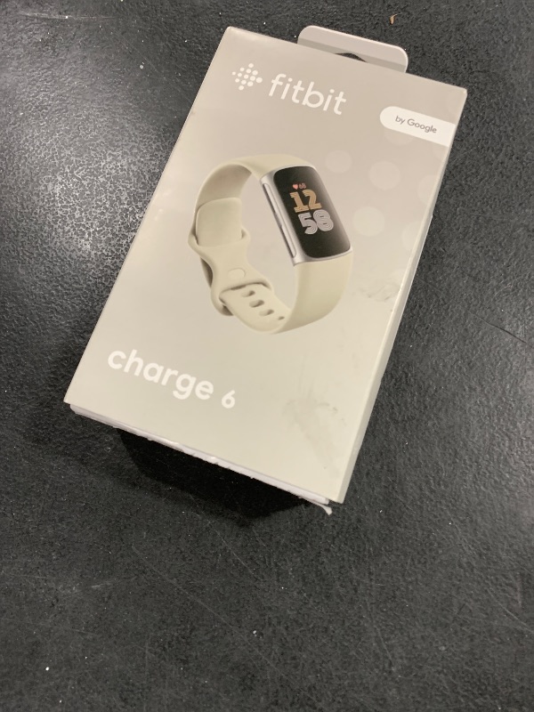 Photo 1 of Fitbit Charge 6 Fitness Tracker with Google apps, Heart Rate on Exercise Equipment, 6-Months Premium Membership Included, GPS, Health Tools and More, Porcelain/Silver, One Size (S & L Bands Included)