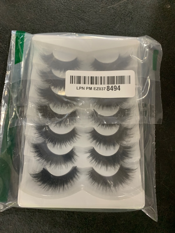 Photo 1 of Pooplunch False Eyelashes Cat Eye Look 18MM Dramatic Volume Thick Wispy Long Faux Mink Lashes Fake Eyelash Strips 7 Pairs Pack