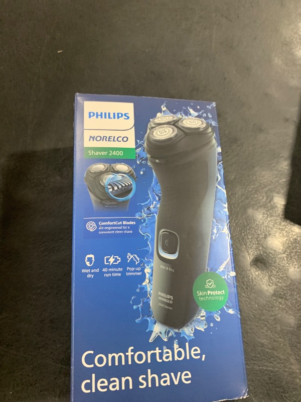 Photo 1 of Philips Norelco Shaver 2400 Series, Wet and Dry Electric Shaver, Pop-up Trimmer, P-Cap, Deep Black, Model X3001/90