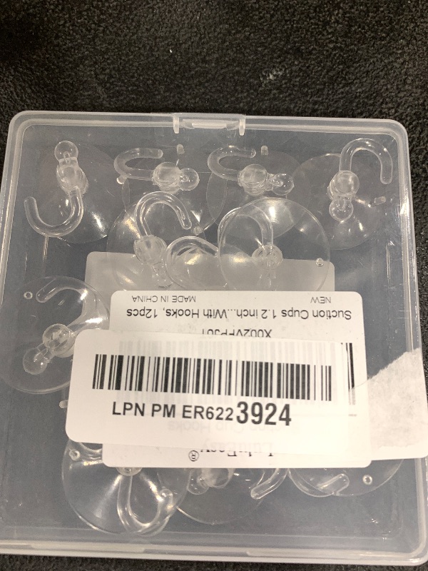Photo 1 of LuluEasy 12 Pieces Small Suction Cups with Hooks 1.2 inch Clear Plastic Sucker Hooks for Glass Window Wall Festivals Parties Theme Carnival Decoration Door Bathroom Kitchen