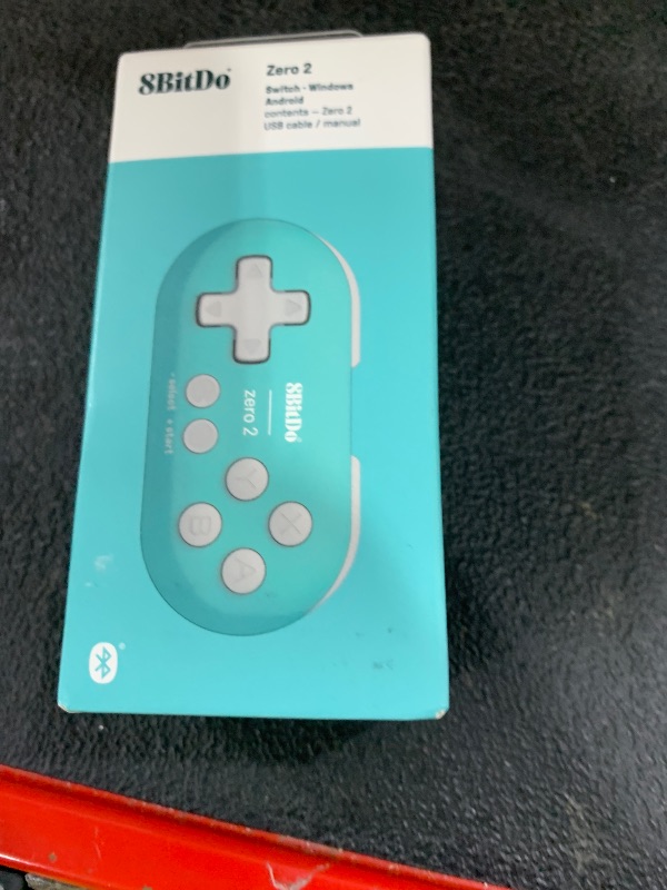 Photo 1 of Nargos 8Bitdo Zero 2 Bluetooth Key Chain Sized Mini Controller for Nintendo Switch, Windows, Android and macOS (Turquoise Edition)
