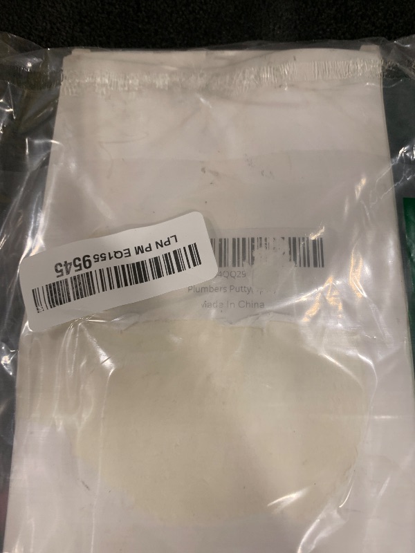 Photo 1 of White Waterproof Duct Seal Putty