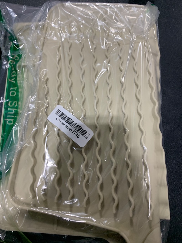 Photo 1 of Silicone Dish Drying Mat for Kitchen Counter or Sink , Heat-resistant Dish Dryer Mat with Built-in Drain Lip , Non-Slip Drain Pad Protects Surfaces Prevents Water Build UP (Beige, 13x15.8 Inch)