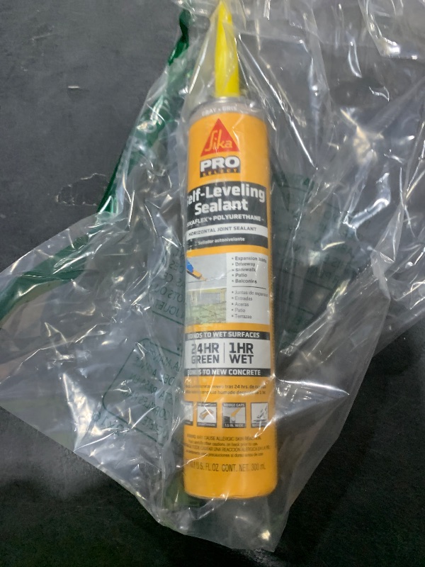 Photo 1 of SIKA Sikaflex Self-Leveling Sealant, Gray Polyurethane, Fast Curing, for Concrete Expansion Joints, Waterproof, Paintable, Fills Cracks up to 1.5 in., 10.1 fl. oz Cartridge