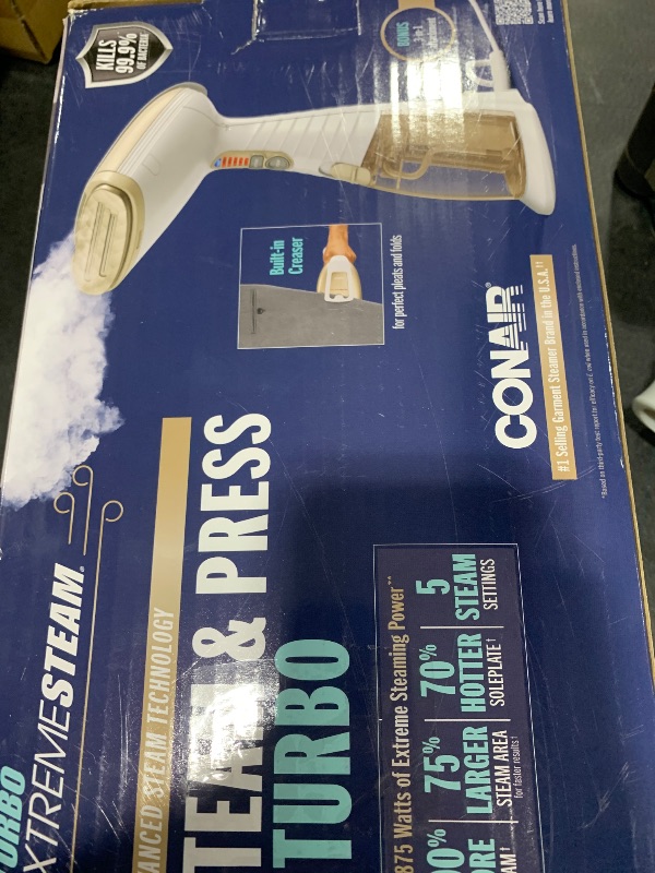 Photo 1 of Conair Handheld Garment Steamer for Clothes, Turbo ExtremeSteam 1875W Fabric Steamer, Portable Handheld Design, Strong Penetrating Steam, White/Champagne