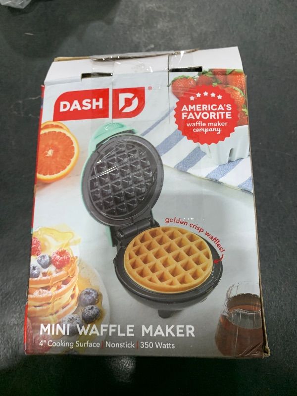 Photo 1 of DASH Mini Waffle Maker - 4” Waffle Mold, Nonstick Waffle Iron with Quick Heat-Up, PTFE Nonstick Surface - Perfect Mini Waffle Maker for Kids and Families, Just Add Batter (Aqua)
