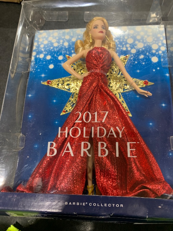 Photo 1 of Barbie 2017 Holiday Doll with Red Metallic Gown and Accessories