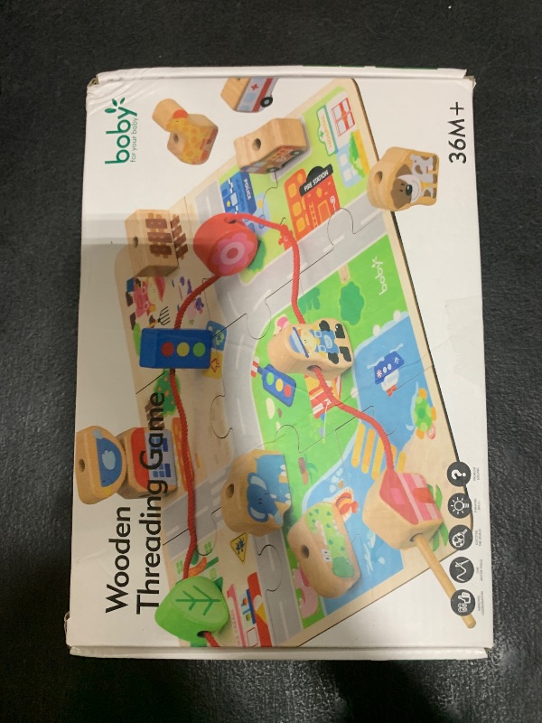 Photo 1 of 24-Piece Real Wood Bead Threading Puzzle Blocks with Traffic Scenario Game Board - Kids' Educational Toy Set with 2 Stringing Sticks & Cotton Storage Bag(Ages 3-6)