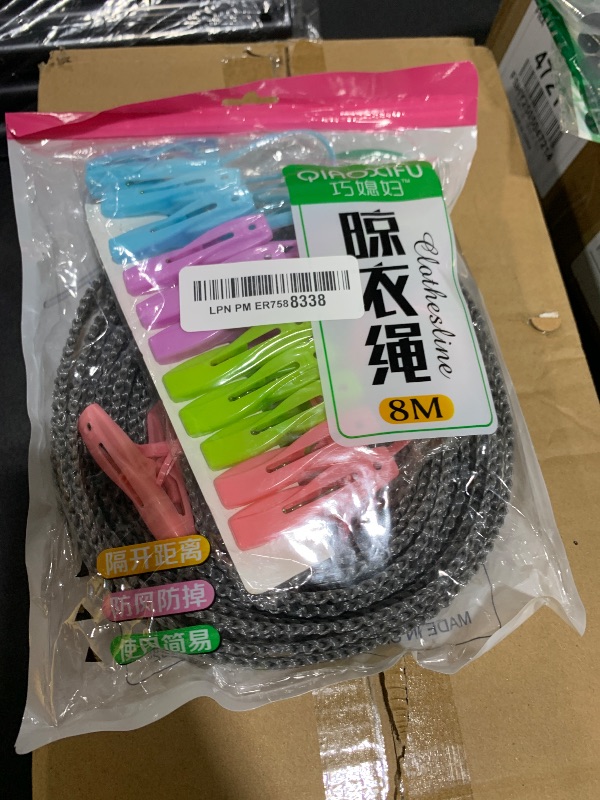 Photo 1 of uxcell Windproof Clothesline, 8M 26ft Plastic Non-Slip Clothes Drying Rope with 12 Clips, Portable Washing Line for Outdoor Camping Traveling, Grey