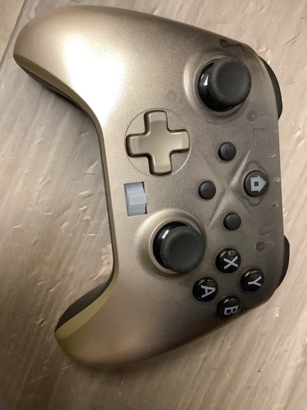 Photo 1 of xbox rh 1022/1023 wireless bluetooth mobile gaming controller in color shadow gold