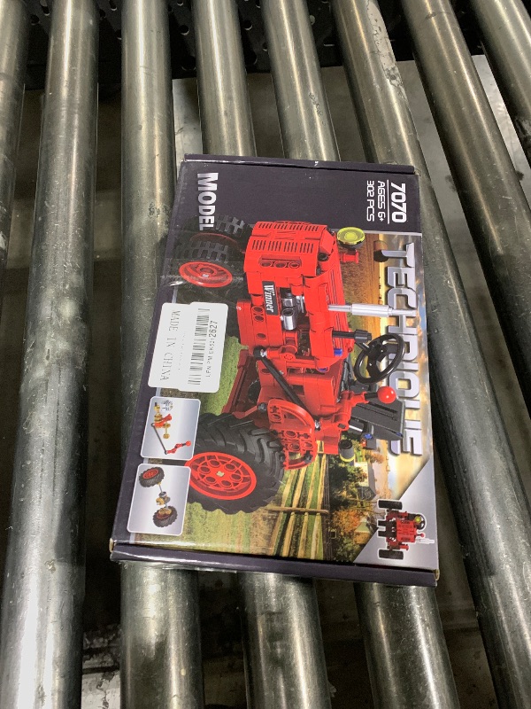 Photo 1 of A XINAO TOYS Classic Building Blocks 1/12 Red Tractor Farm Toy Building Set Gift for Kids Ages 6 7 8 9 10 11 12 Includes Shifting Structure, Steering Structure Features (Classic Edition)