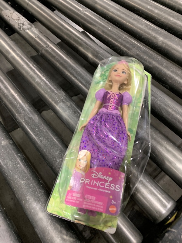 Photo 1 of Mattel Disney Princess Toys, Rapunzel Fashion Doll, Sparkling Look with Blonde Hair, Blue Eyes & Tiara Accessory, Inspired by the Movie Tangled
