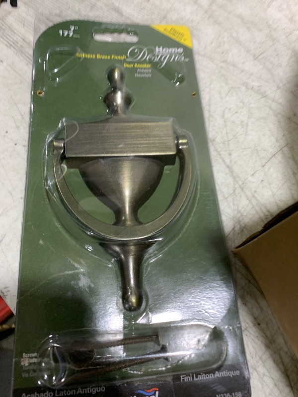 Photo 1 of National Hardware N336-156 V1914 Door Knocker in Antique Brass,7"